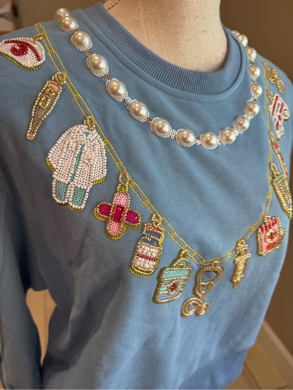 New! QUEEN OF SPARKLES Blue Sequin Medical Supply Necklace Sweatshirt - Picture 3 of 9